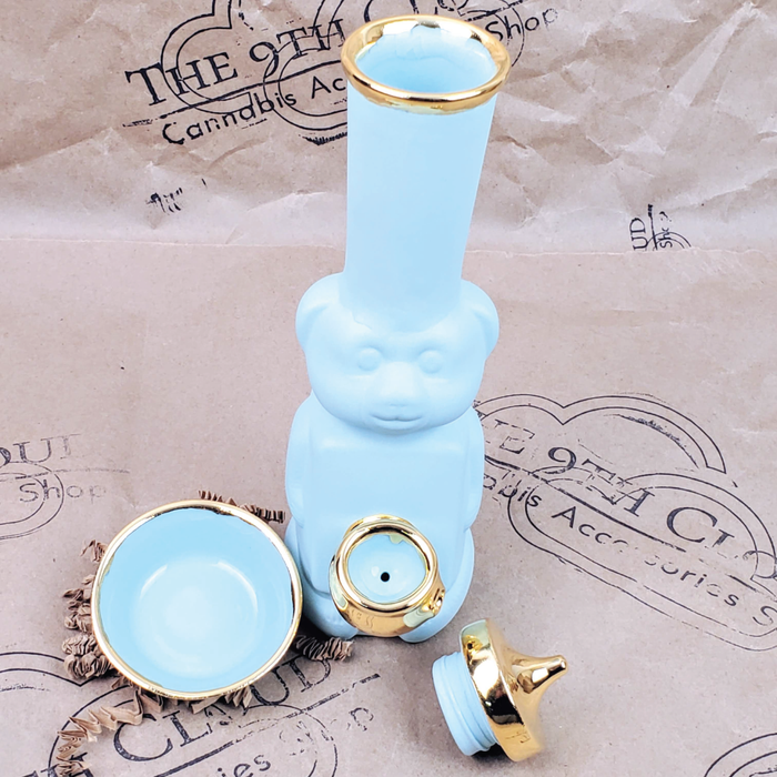 HONEY BEAR BUBBLER BONG WITH BOWL IN MATTE TURQUOISE  AND GOLD WITH THE 9TH CLOUD CANNABIS ACCESSORIES SHOP LOGO BACKGROUND