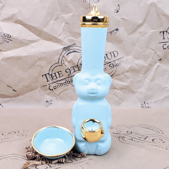 HONEY BEAR BUBBLER BONG WITH BOWL IN MATTE TURQUOISE  AND GOLD WITH THE 9TH CLOUD CANNABIS ACCESSORIES SHOP LOGO BACKGROUND