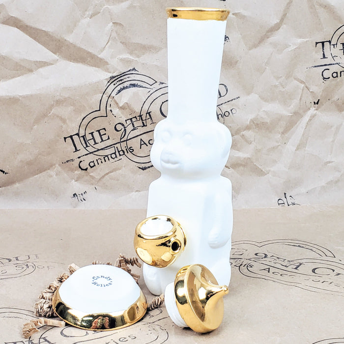 HONEY BEAR BUBBLER BONG WITH BOWL IN MATTE WHITE  AND GOLD WITH THE 9TH CLOUD CANNABIS ACCESSORIES SHOP LOGO BACKGROUND