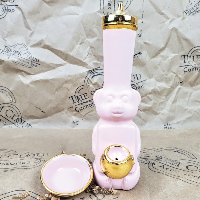 HONEY BEAR BUBBLER BONG WITH BOWL IN MATTE PINK AND GOLD WITH THE 9TH CLOUD CANNABIS ACCESSORIES SHOP LOGO BACKGROUND