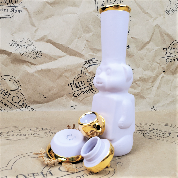 HONEY BEAR BUBBLER BONG WITH BOWL IN MATTE LAVENDER AND GOLD WITH THE 9TH CLOUD CANNABIS ACCESSORIES SHOP LOGO BACKGROUND