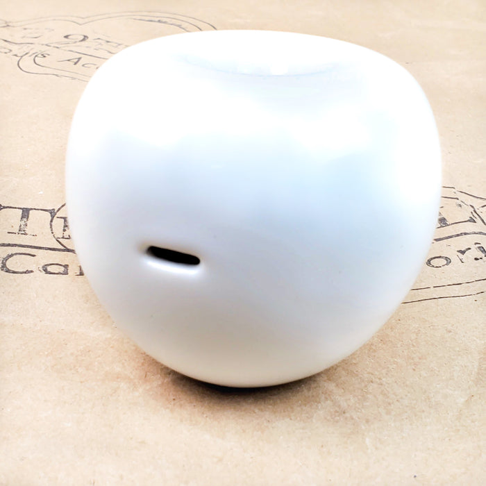 WHITE CERAMIC APPLE PIPE BY SUMMERLAND CERAMICS ON A THE 9TH CLOUD CANNABIS ACCESSORIES SHOP LOGO BACKGROUND