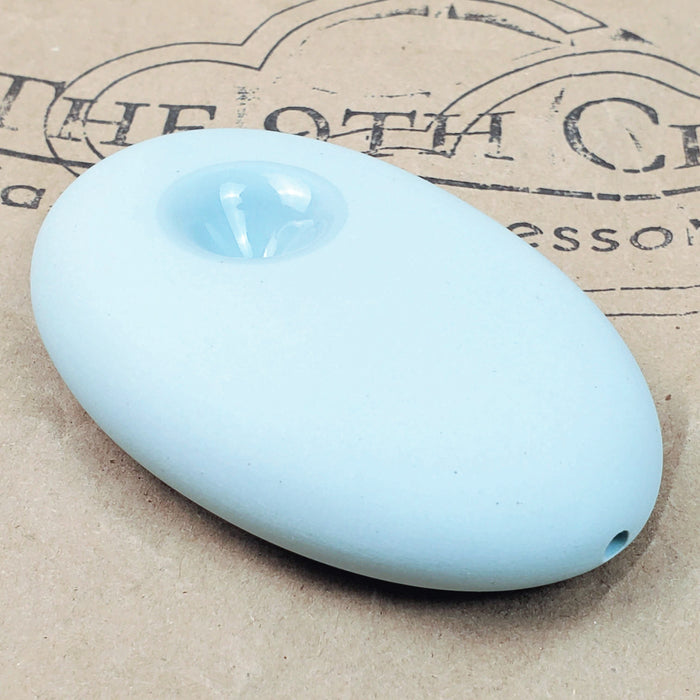 LIGHT BLUE CERAMIC HAND PIPE BY MIWAK JUNIOR ON THE 9THCLOUD CANNABIS ACCESSORIES SHOP LOGO BACKGROUND