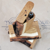 LIVE EDGE OAK WOOD DUGOUT WITH THE 9TH CLOUD LOGO WITH GLASS PIPE ON THE 9TH CLOUD CANNABIS ACCESSORIES LOGO BACKGROUND
