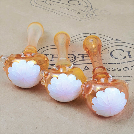 GLASS PIPE WITH PINK FLOWER PEDAL DESIGN ON THE 9TH CLOUD CANNABIS ACCESSORIES SHOP LOGO BACKGROUND