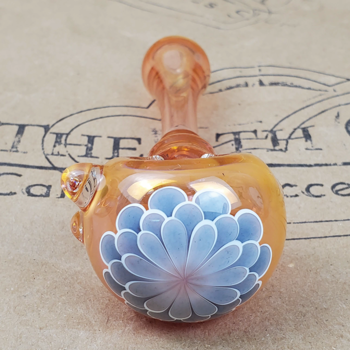 GLASS PIPE WITH GREY BLUE  FLOWER PEDAL DESIGN ON THE 9TH CLOUD CANNABIS ACCESSORIES SHOP LOGO BACKGROUND